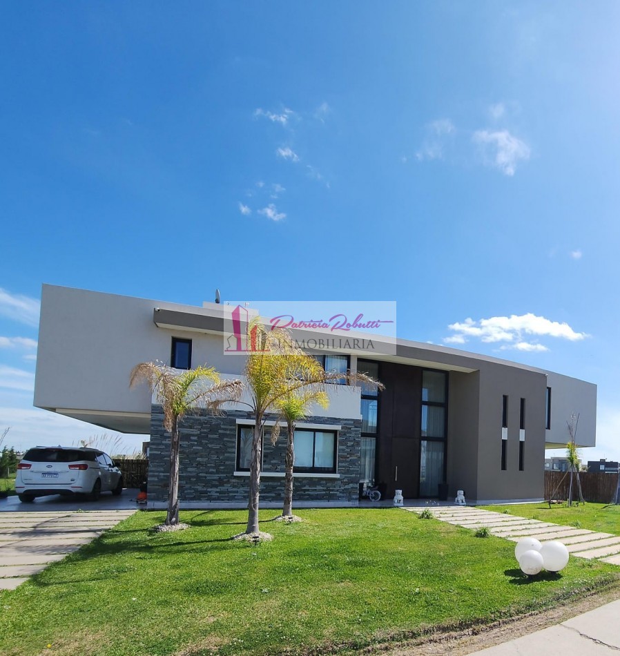 EN VENTA CASA 6 AMBIENTES CON PISCINA Y 2 COCHERAS EN BARRIO PRIVADO LAGOS DE CANNING