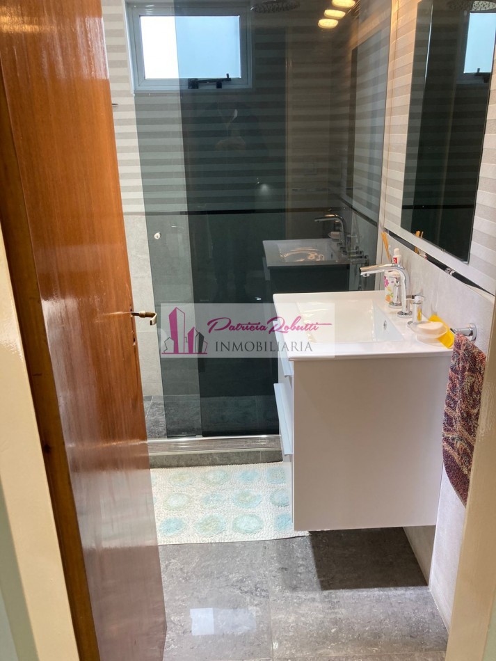 EN VENTA HERMOSA CASA 4 AMBIENTES CON GARAGE, JARDIN, QUINCHO Y PATIO SAN JUSTO