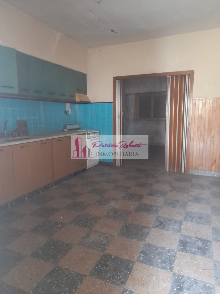 EN VENTA CASA CON LOTE LIBRE TERRENO EN VILLA LUGANO